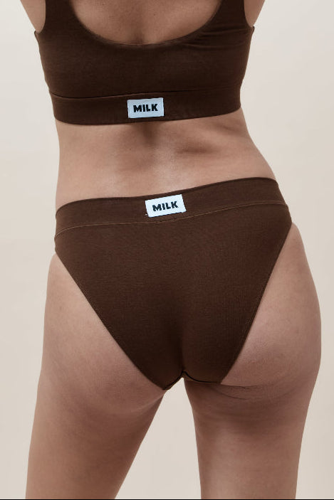 Mother wearing brown maternity underwear from Milk Label 